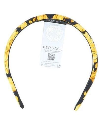 versace head band|Versace hair clips.